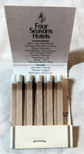 Load image into Gallery viewer, Four Seasons Hotels Peace Of Mind Vintage Matchbook Mid 1980's - TulipStuff