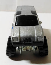 Load image into Gallery viewer, Hot Wheels #7530 Trailbusters Tall Ryder 4WD Minivan CT 1987 - TulipStuff