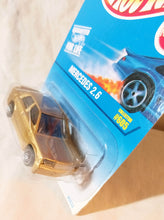 Load image into Gallery viewer, Hot Wheels Collector #605 Mercedes 2.6 190E Sedan 1997 - TulipStuff