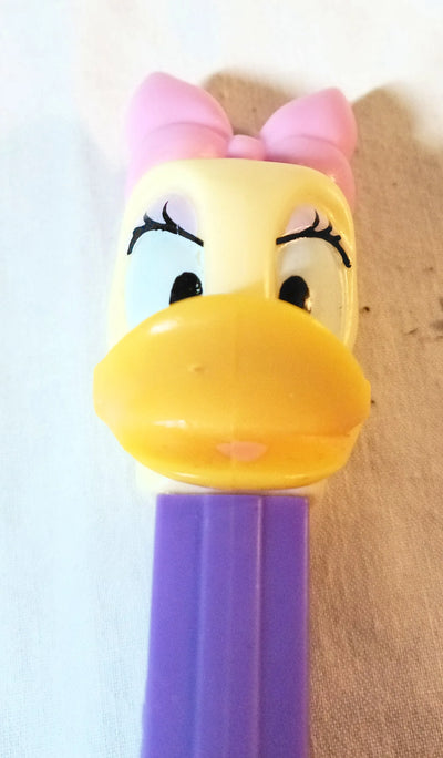 Pez Daisy Duck Candy Dispenser Purple Hungary 1997 - TulipStuff