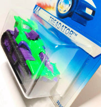Load image into Gallery viewer, Hot Wheels no. 3035 Treadator Tank 1994 Canada International Card - TulipStuff