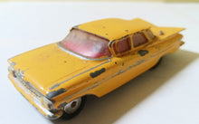 Load image into Gallery viewer, Corgi Toys 221 Chevrolet Impala Taxi Cab Great Britain 1960 - TulipStuff
