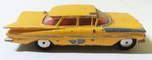 Load image into Gallery viewer, Corgi Toys 221 Chevrolet Impala Taxi Cab Great Britain 1960 - TulipStuff
