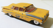 Load image into Gallery viewer, Corgi Toys 221 Chevrolet Impala Taxi Cab Great Britain 1960 - TulipStuff
