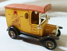 Load image into Gallery viewer, Lledo DG6 026 Marcol M.A. Rapport 1920 Ford Model T Van England Brown - TulipStuff
