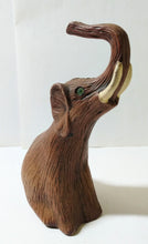 Load image into Gallery viewer, Vintage Elephant Trunk Up Green Eyed Figurine Hong Kong Early 1970&#39;s - TulipStuff
