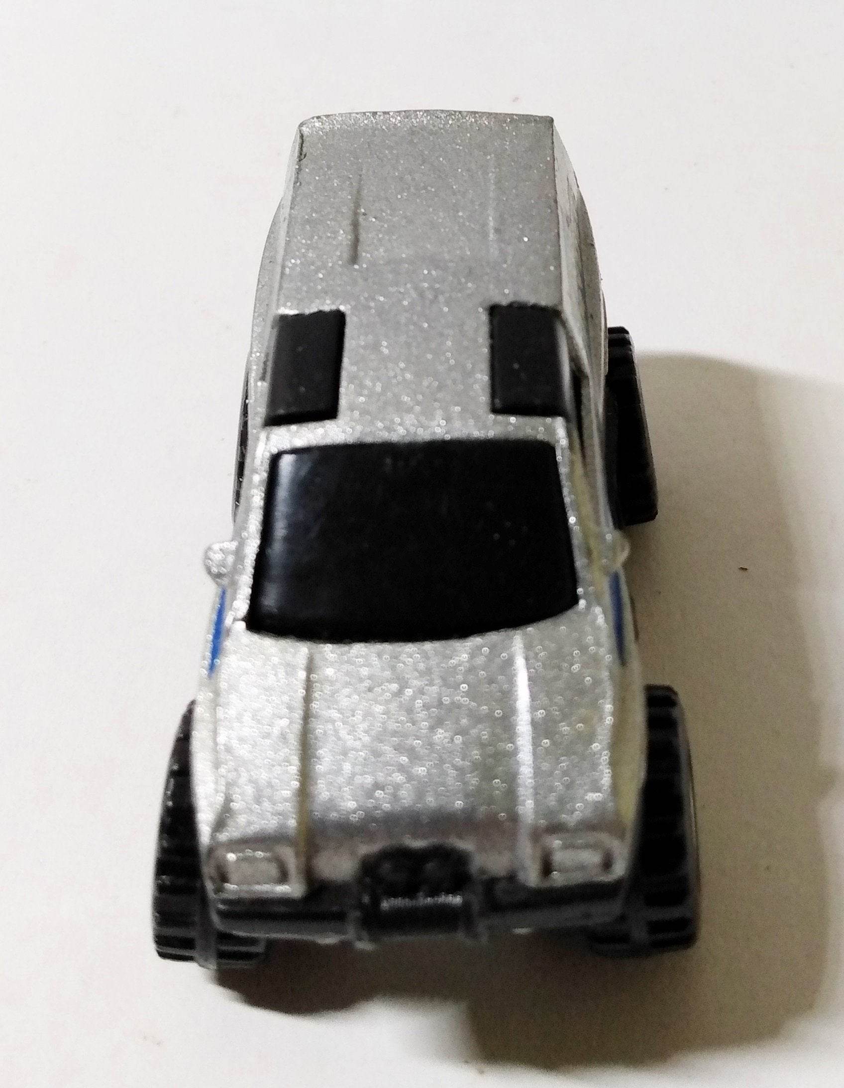 Hot Wheels #7530 Trailbusters Tall Ryder 4WD Minivan CT 1987 - TulipStuff