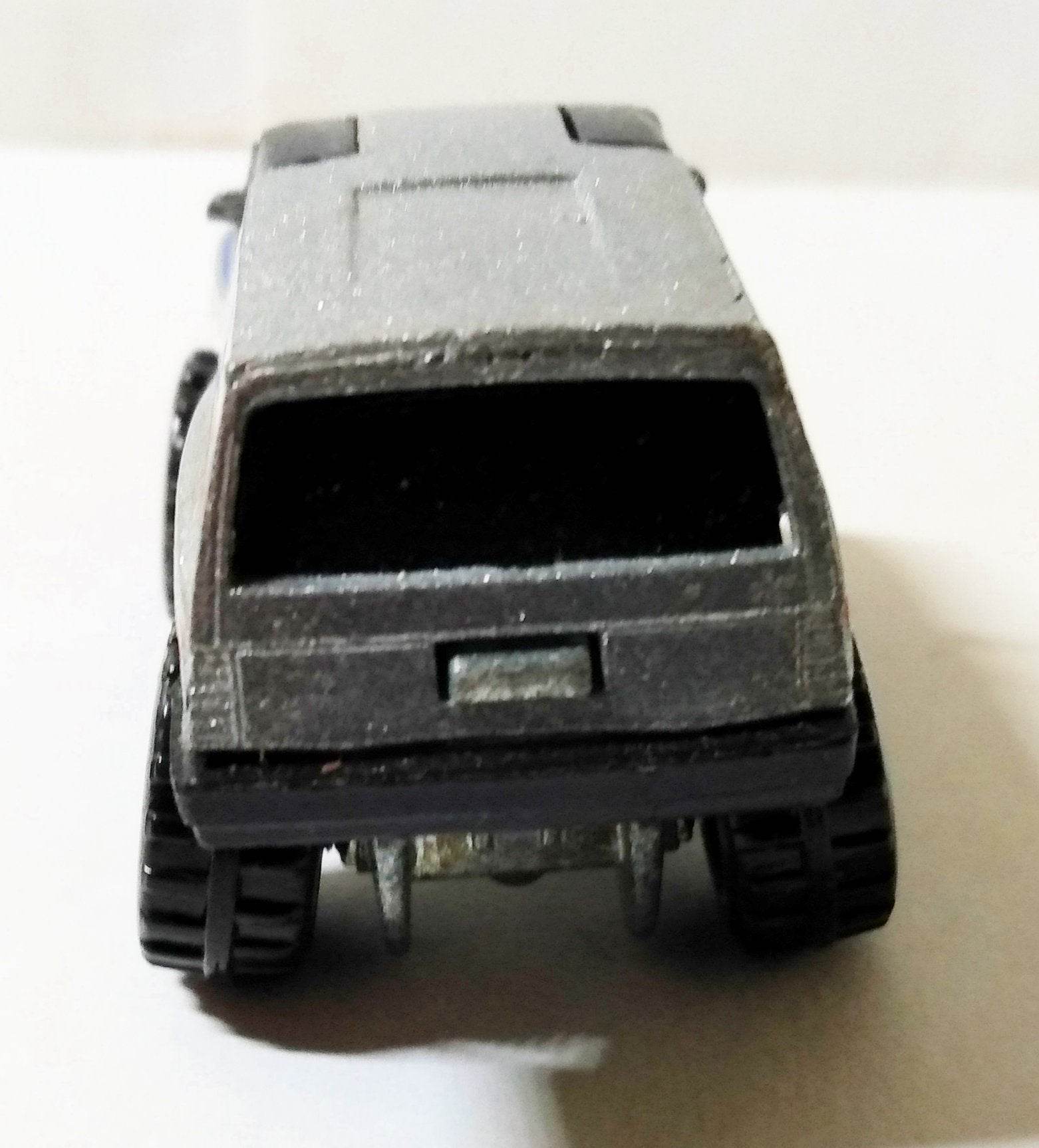 Hot Wheels #7530 Trailbusters Tall Ryder 4WD Minivan CT 1987 - TulipStuff