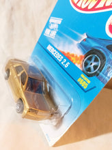 Load image into Gallery viewer, Hot Wheels Collector #605 Mercedes 2.6 190E Sedan 1997 - TulipStuff
