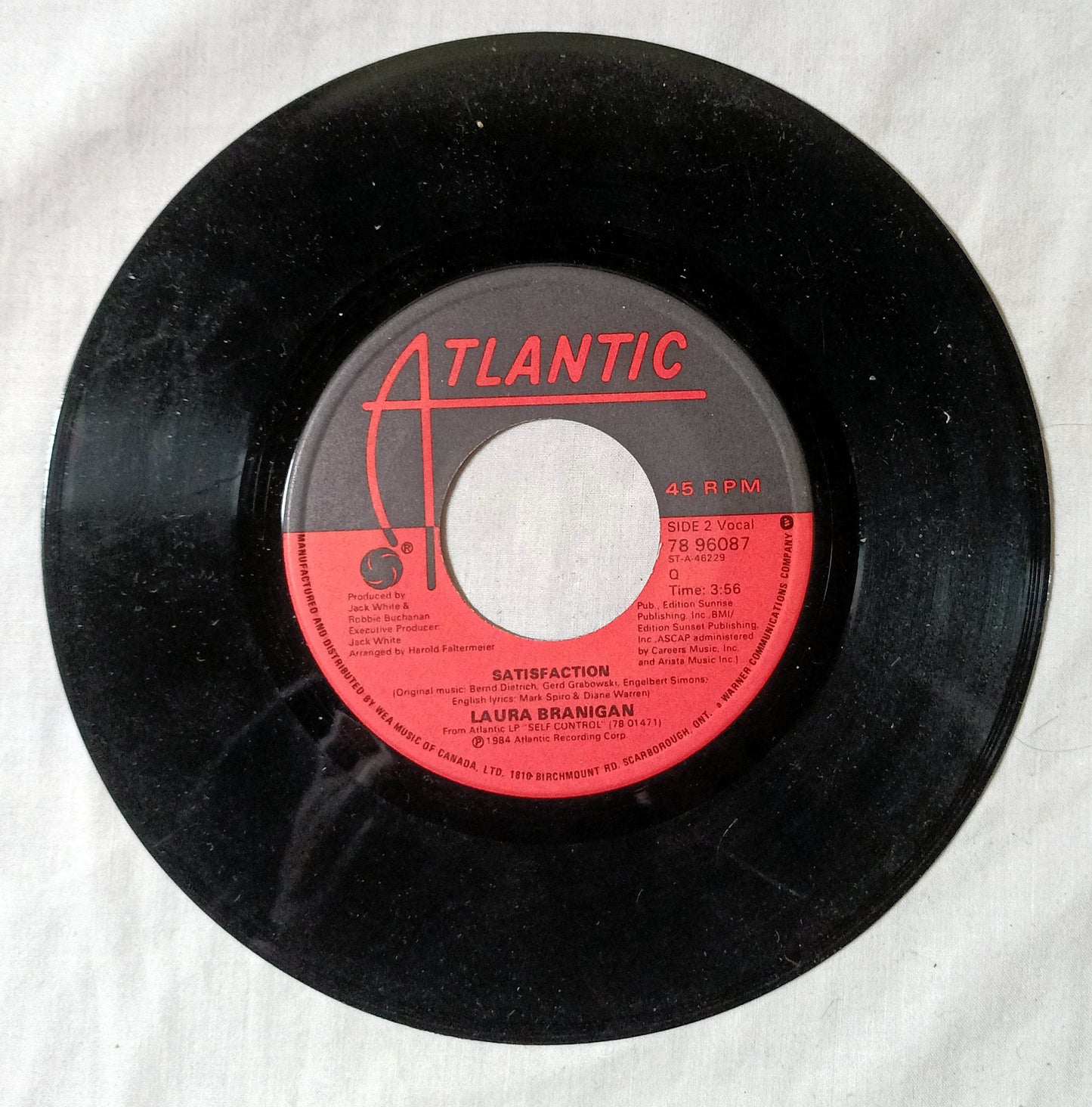 Laura Branigan Ti Amo / Satisfaction Synthpop  7" Vinyl 45 Canada 1984 - TulipStuff