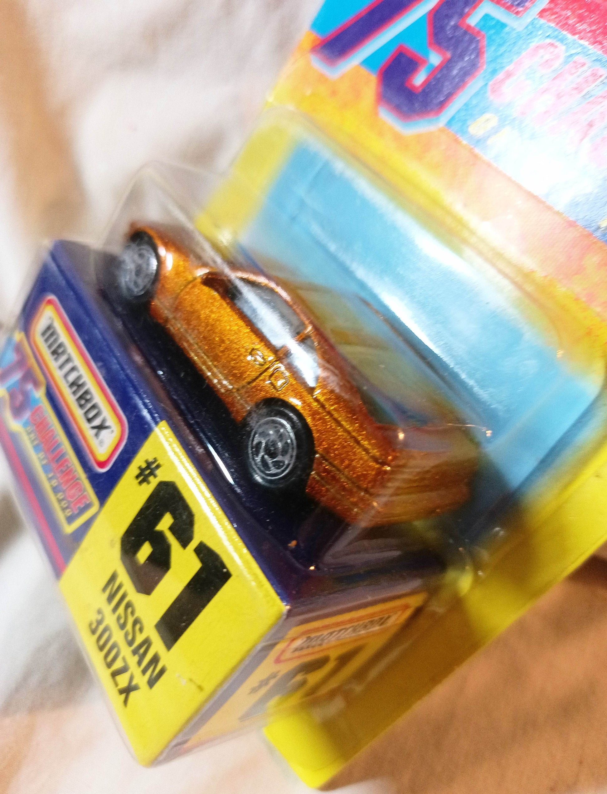 Matchbox 75 Challenge #61 Nissan 300ZX Gold Limited Edition 1997 - TulipStuff