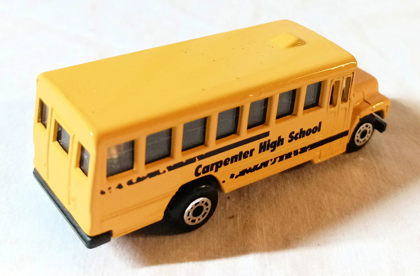 Matchbox #12 School Bus Carpenter High School 1996 - TulipStuff