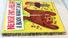 Load image into Gallery viewer, Never Pat A Bear A Book About Signs Little Golden Book #105 1972 - TulipStuff
