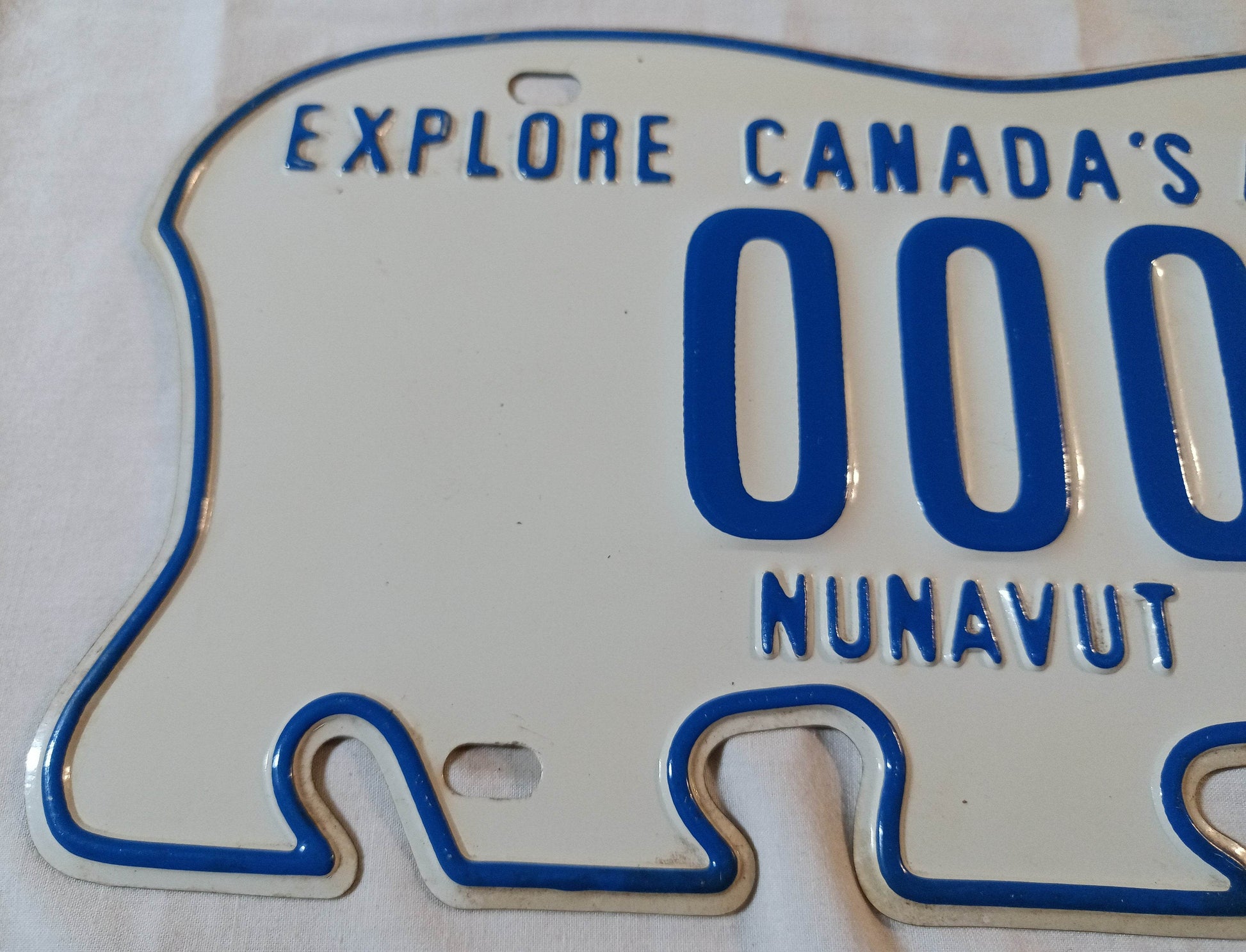 Nunavut Polar Bear Sample Car License Plate Canada 1999 - TulipStuff