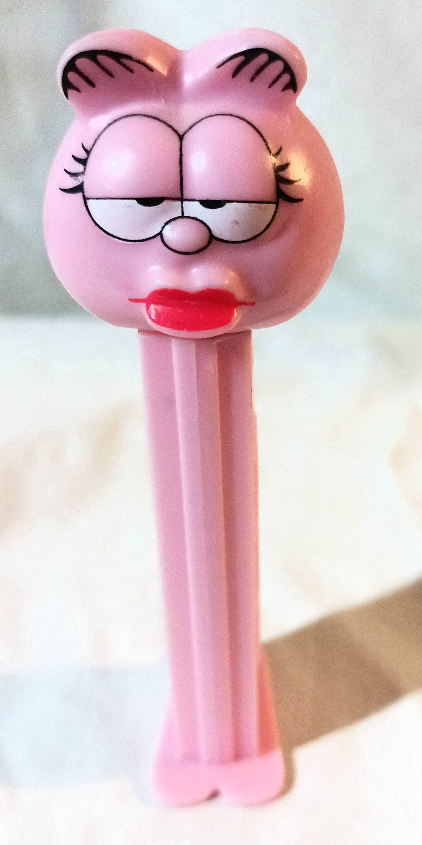 Pez Arlene the Pink Cat (from Garfield) Candy Dispenser Slovenia 1991 - TulipStuff