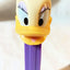Pez Daisy Duck Candy Dispenser Purple Hungary 1997 - TulipStuff