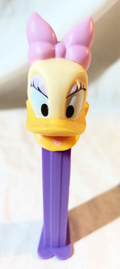 Pez Daisy Duck Candy Dispenser Purple Hungary 1997 - TulipStuff