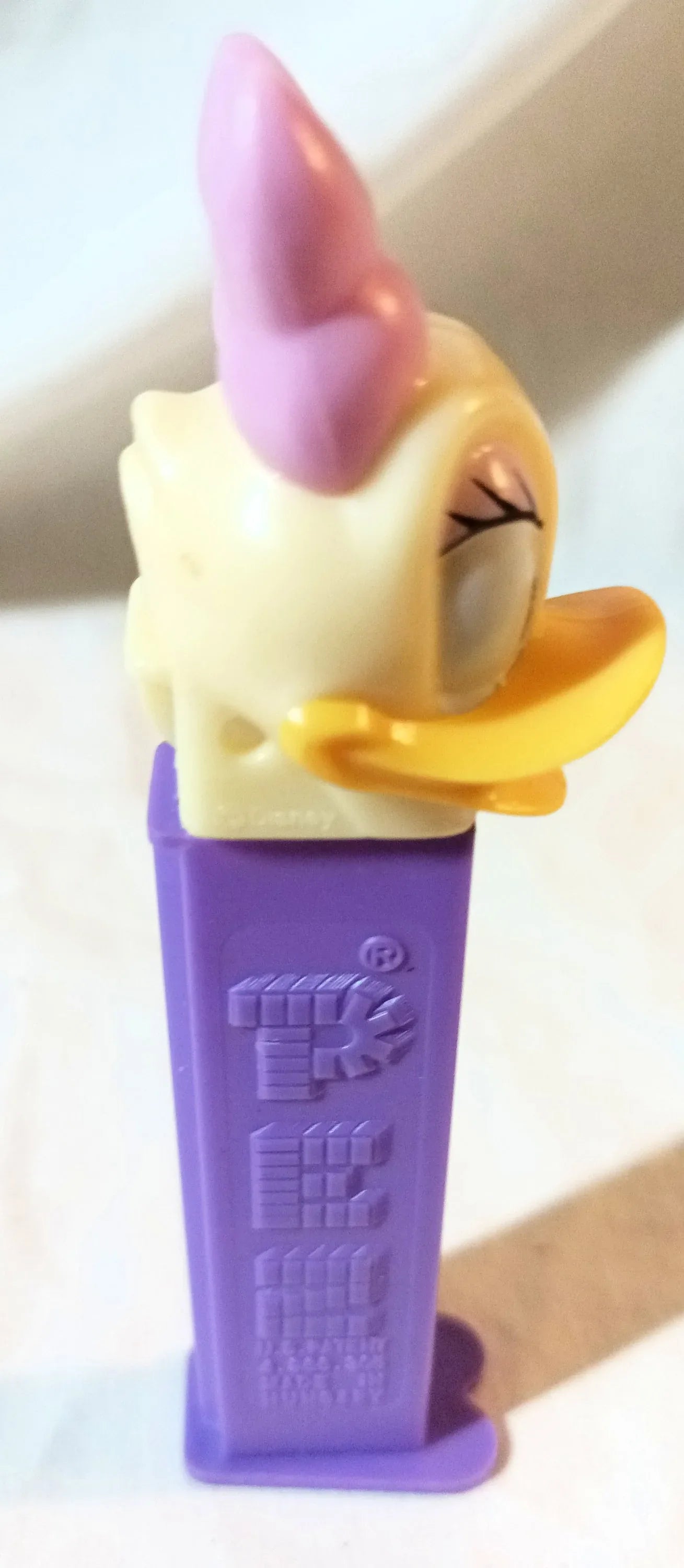 Pez Daisy Duck Candy Dispenser Purple Hungary 1997 - TulipStuff