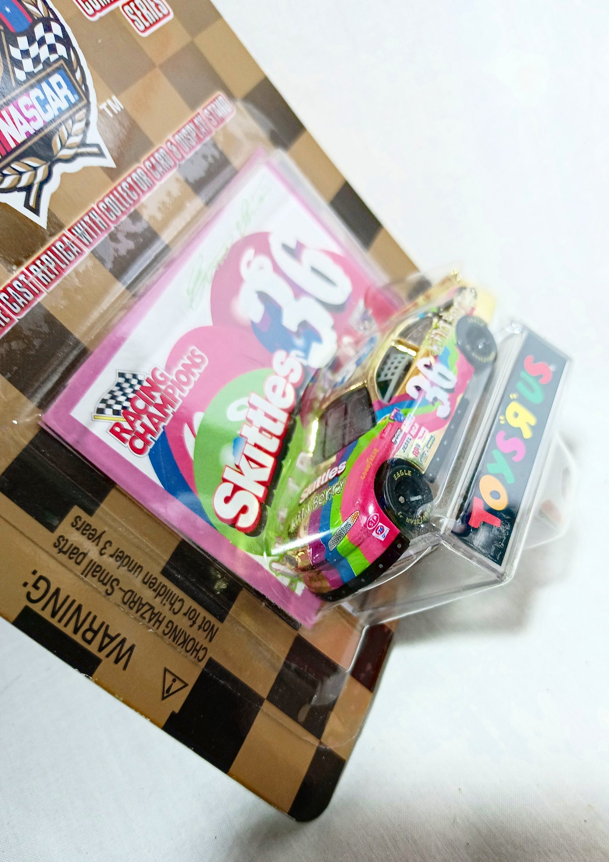 Racing Champions ToysRUs 1998 Ernie Irvan Wildberry Skittles Pontiac - TulipStuff