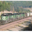 Burlington Northern EMD SD40-2 Locomotive Hauling Grain Belton Montana - TulipStuff