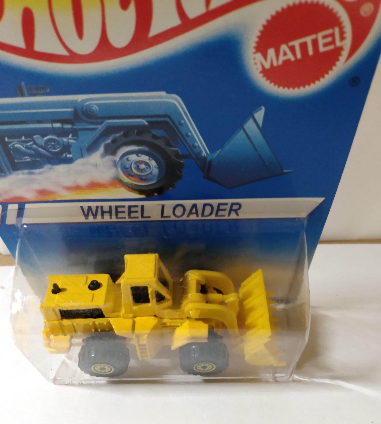 Hot Wheels 1173 Wheel Loader Canada International Card 1994 - TulipStuff