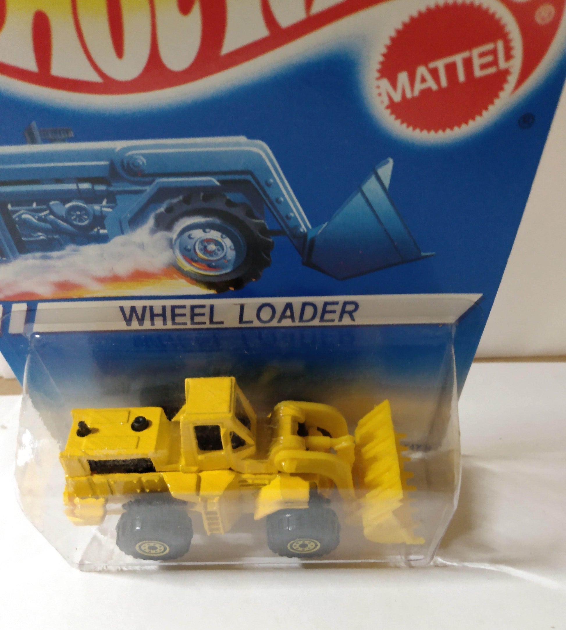 Hot Wheels 1173 Wheel Loader Canada International Card 1994 - TulipStuff