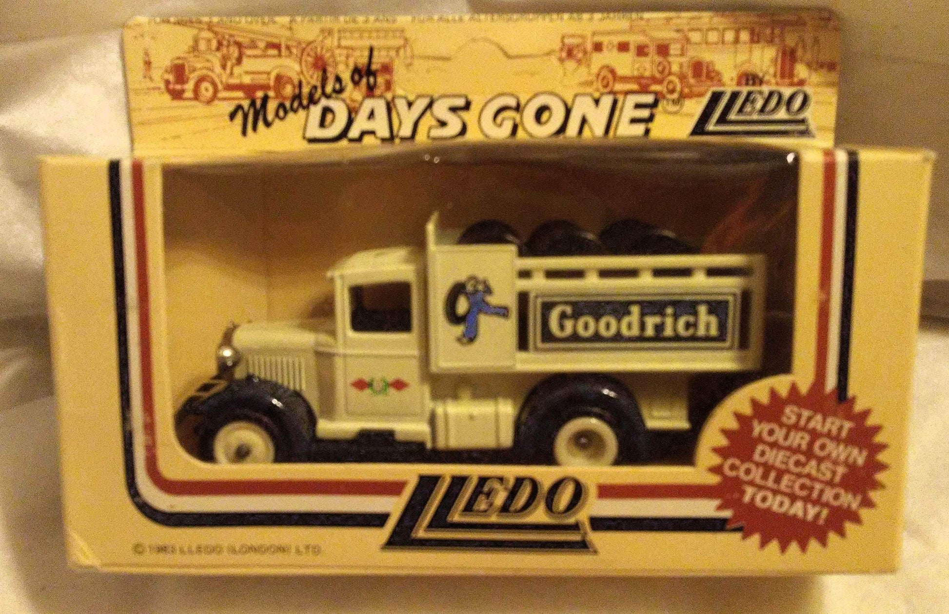 Lledo Models of Days Gone DG20 Goodrich 1936 Ford Stake Truck Made in England - TulipStuff