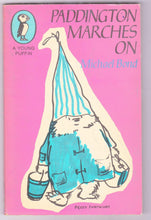 Load image into Gallery viewer, Paddington Marches On Michael Bond Paperback Young Puffin Edition Great Britain 1971 - TulipStuff
